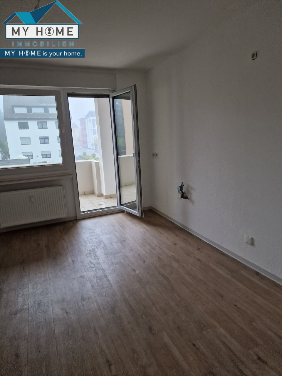  Wohnküche mit Zugang zum Sonnenbalkon