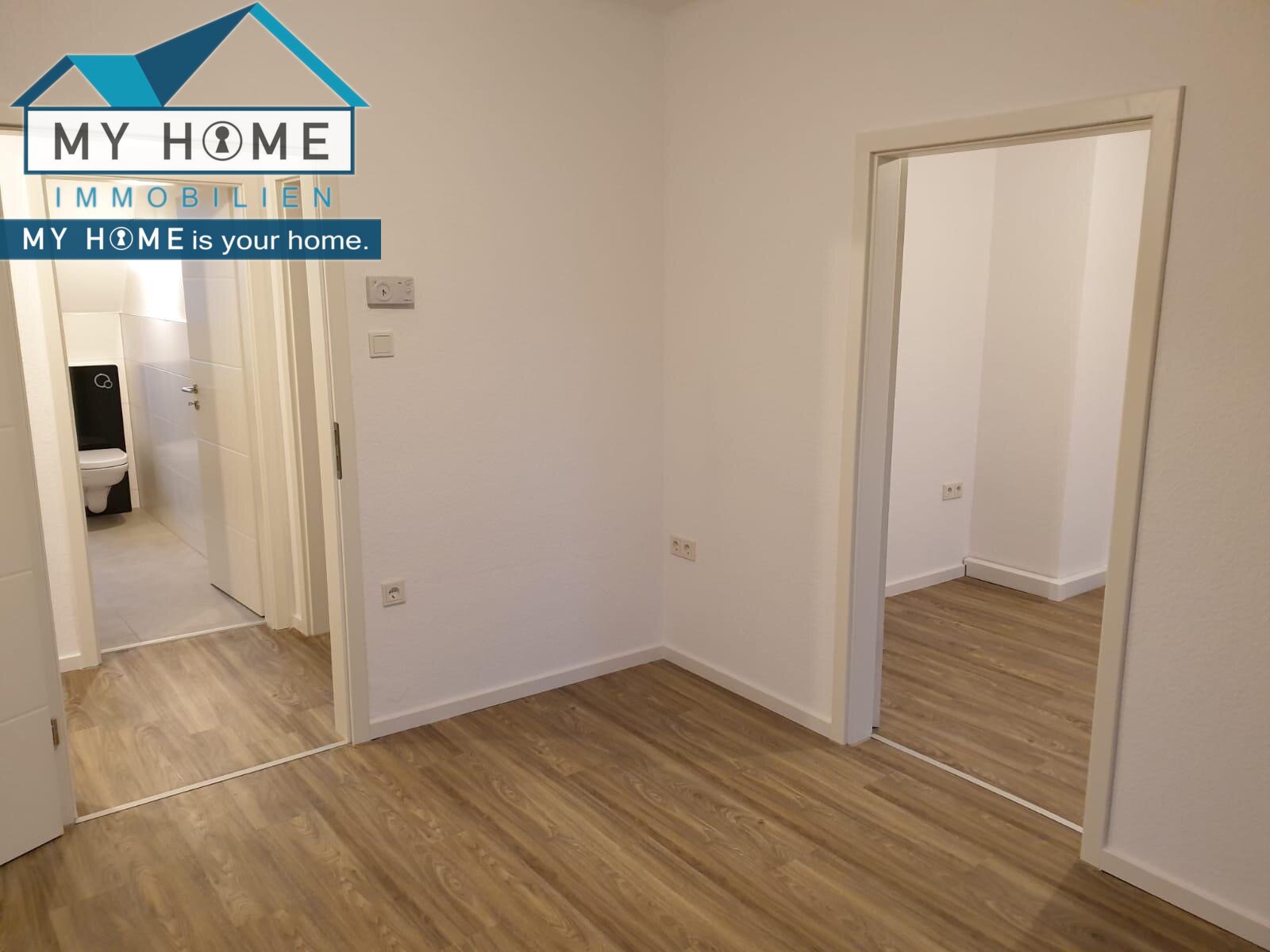 Wohnzimmer Durchgang zum Büro/Ankleidezimmer Wohnzimmer Durchgang zum Büro/Ankleidezimmer